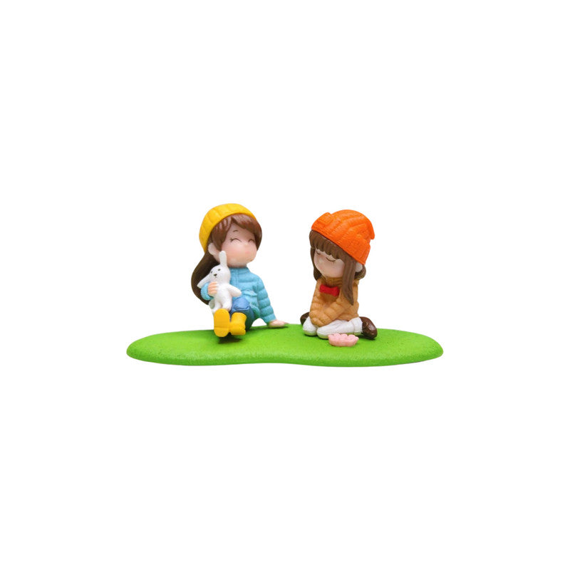 Wonderland imported miniatures ( pack of 4 ) girls on grass